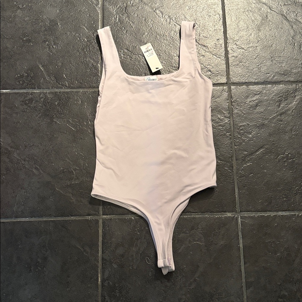 Blue Rain Soft Pink Thong Bodysuit from Francesca’s